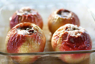 baked apples in a glass pan